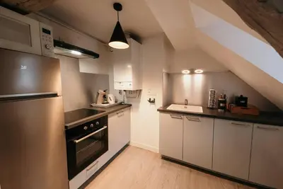 Cuisine ou kitchenette dans l'établissement Appartement de Romain