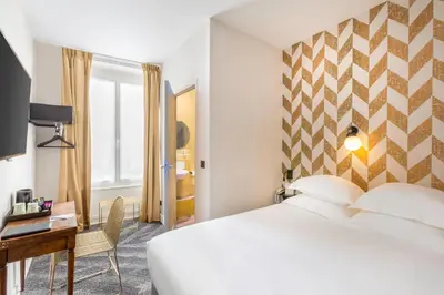 Un ou plusieurs lits dans un hébergement de l'établissement Best Western Hotel Centre Reims