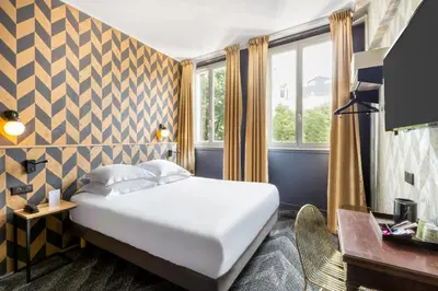 Un ou plusieurs lits dans un hébergement de l'établissement Best Western Hotel Centre Reims