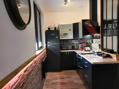Cuisine ou kitchenette dans l'établissement Gite Motobecane