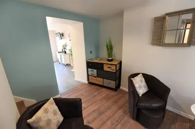 Coin salon dans l'établissement Terrasse 86 - Terrasse & Climatisation - 4-6 personnes - BnB Epernay