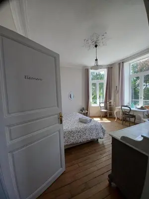Un ou plusieurs lits dans un hébergement de l'établissement Chambres d'Hôtes des Rouets