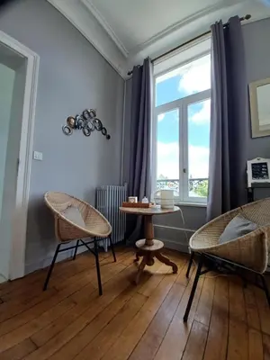 Coin salon dans l'établissement Chambres d'Hôtes des Rouets
