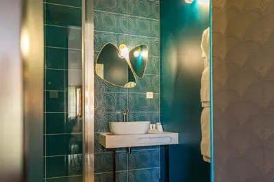 Salle de bains dans l'établissement La Ressourçante