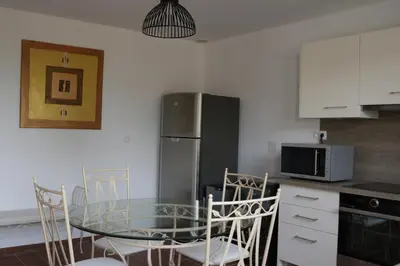 Cuisine ou kitchenette dans l'établissement LA LOGIA DU SAULE