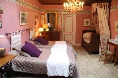 Un ou plusieurs lits dans un hébergement de l'établissement chambres d'hotes : La cour d'Etrepy