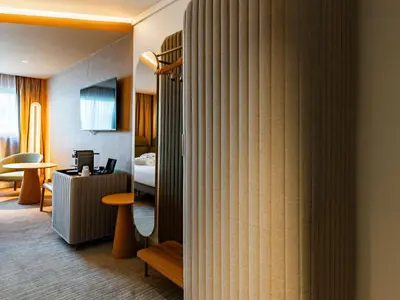 Coin salon dans l'établissement Novotel Reims Tinqueux
