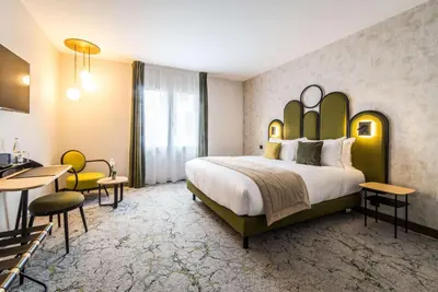 Un ou plusieurs lits dans un hébergement de l'établissement Best Western Le Relais du Vigneron