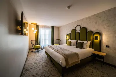 Un ou plusieurs lits dans un hébergement de l'établissement Best Western Le Relais du Vigneron