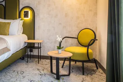 Un ou plusieurs lits dans un hébergement de l'établissement Best Western Le Relais du Vigneron