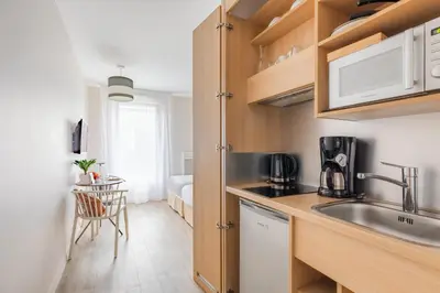 Cuisine ou kitchenette dans l'établissement Appart'City Classic Reims Parc des Expositions