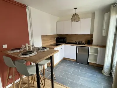 Cuisine ou kitchenette dans l'établissement Le W - Appart vintage