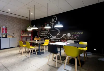 Restaurant ou autre lieu de restauration dans l'établissement B&B HOTEL Reims Centre Erlon