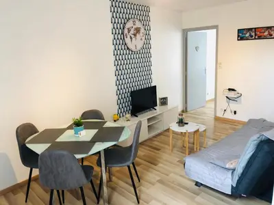 Télévision ou salle de divertissement dans l'établissement Appartement Aventure à Épernay