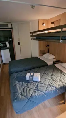 Un ou plusieurs lits dans un hébergement de l'établissement Premiere Classe Compiegne - Jaux
