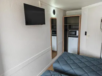 Cuisine ou kitchenette dans l'établissement Premiere Classe Compiegne - Jaux