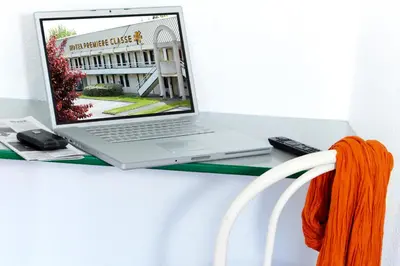 Télévision ou salle de divertissement dans l'établissement Premiere Classe Coulommiers Mouroux