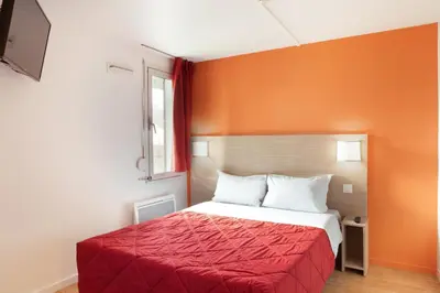 Un ou plusieurs lits dans un hébergement de l'établissement Premiere Classe Meaux Nanteuil Les Meaux