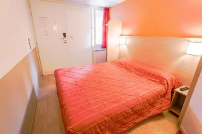Un ou plusieurs lits dans un hébergement de l'établissement Premiere Classe St Quentin