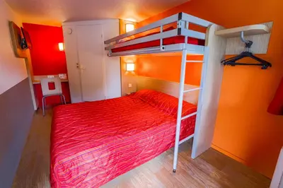 Un ou plusieurs lits dans un hébergement de l'établissement Premiere Classe St Quentin