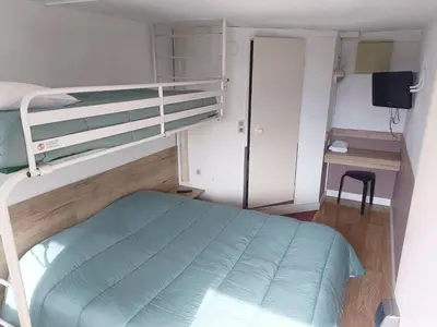 Un ou plusieurs lits dans un hébergement de l'établissement FASTHOTEL Reims Est - Taissy
