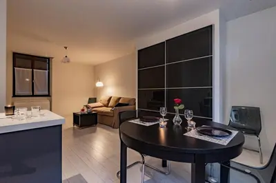 Coin salon dans l'établissement REIMS LA ROMAINE