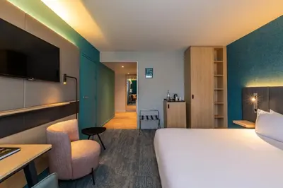 Un ou plusieurs lits dans un hébergement de l'établissement Holiday Inn Reims Centre by IHG