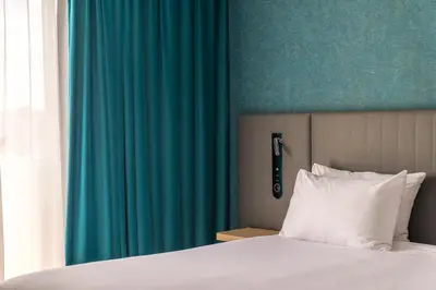 Un ou plusieurs lits dans un hébergement de l'établissement Holiday Inn Reims Centre by IHG