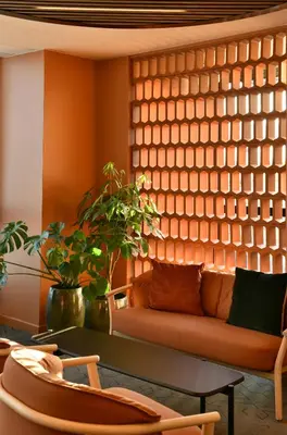 Coin salon dans l'établissement Holiday Inn Reims Centre by IHG