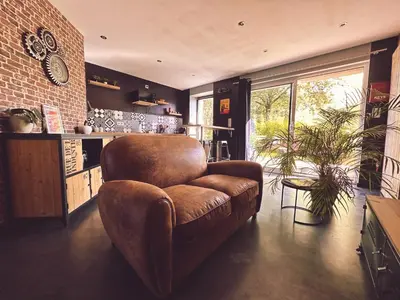 Cuisine ou kitchenette dans l'établissement Le Loft