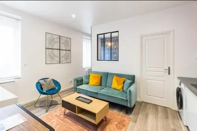Coin salon dans l'établissement Terra logement cosy et charmant