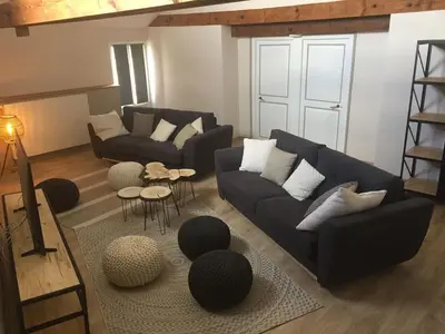 Coin salon dans l'établissement Gîte 8 à 14 personnes en Champagne avec jacuzzi