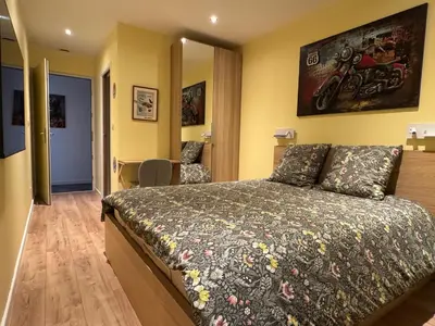 Un ou plusieurs lits dans un hébergement de l'établissement Loft Spa Reims-fr 250m2 privatifs, piscine intérieure chauffée, spa et parking