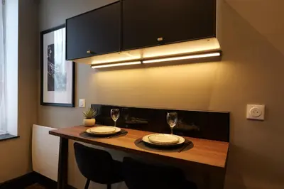Cuisine ou kitchenette dans l'établissement LES BC BG