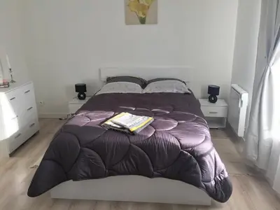 Un ou plusieurs lits dans un hébergement de l'établissement duplex agréable et calme