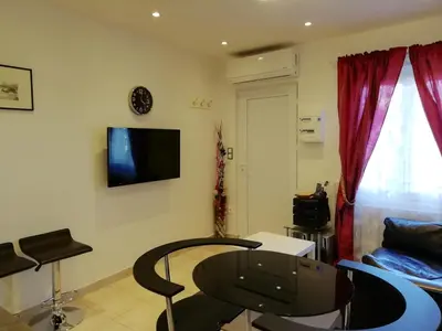 Télévision ou salle de divertissement dans l'établissement Potal