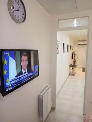 Télévision ou salle de divertissement dans l'établissement Potal