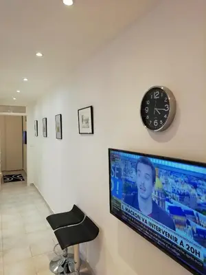 Télévision ou salle de divertissement dans l'établissement Potal
