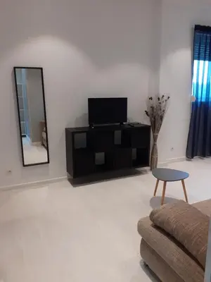 Télévision ou salle de divertissement dans l'établissement La belle étoile