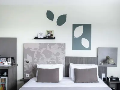 Un ou plusieurs lits dans un hébergement de l'établissement Mercure Compiègne Sud