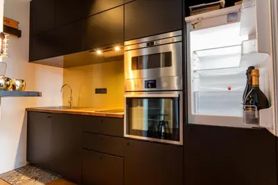 Cuisine ou kitchenette dans l'établissement L’Aristide