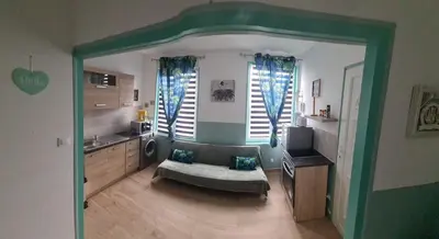 Un ou plusieurs lits dans un hébergement de l'établissement cosy place