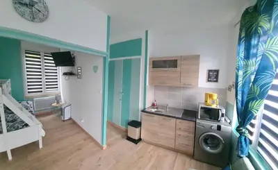 Cuisine ou kitchenette dans l'établissement cosy place