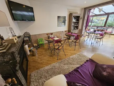 Télévision ou salle de divertissement dans l'établissement Le Corrigot