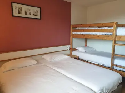 Un ou plusieurs lits dans un hébergement de l'établissement HOTEL Chateau-Thierry Centre