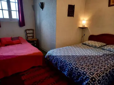 Un ou plusieurs lits dans un hébergement de l'établissement L Ancienne Ferme 17 grand rue