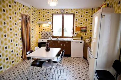 Cuisine ou kitchenette dans l'établissement Gîte Version 70