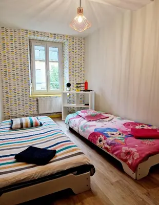 Un ou plusieurs lits dans un hébergement de l'établissement Gîte de vac’s et d’affaires à Monthermé