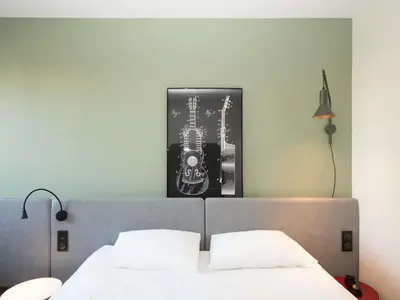 Un ou plusieurs lits dans un hébergement de l'établissement ibis Reims Tinqueux
