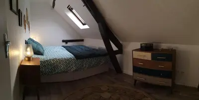 Un ou plusieurs lits dans un hébergement de l'établissement Logement Cosy rénové au pied de la Cathédrale avec climatisation